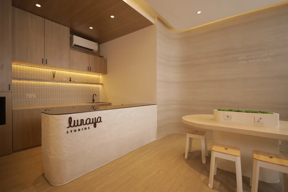 The caf&eacute; counter and the long tasting table beside it
