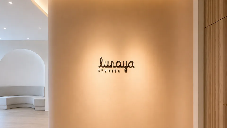 The Lunaya Studios wordmark on the wall of the arched entryway